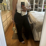 Pantalón ancho con cinturilla asimétrica