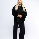 Abrigo con cinturón