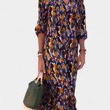 Teodora Vestido Retro con Escote en V y Mangas Abullonadas