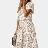 Rovena Vestido Midi de Lunares con Cuello Camisero y Cintura Ajustable