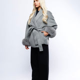 Abrigo con cinturón