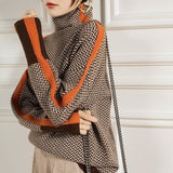 Lucia | Jersey de cuello alto con llamativas rayas contrastantes