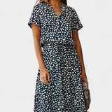 Rovena Vestido Midi de Lunares con Cuello Camisero y Cintura Ajustable