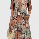 Perla Vestido Boho con Estampado Floral y Detalles en Crochet