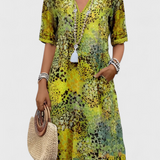 Perla Vestido Boho con Estampado Floral y Detalles en Crochet